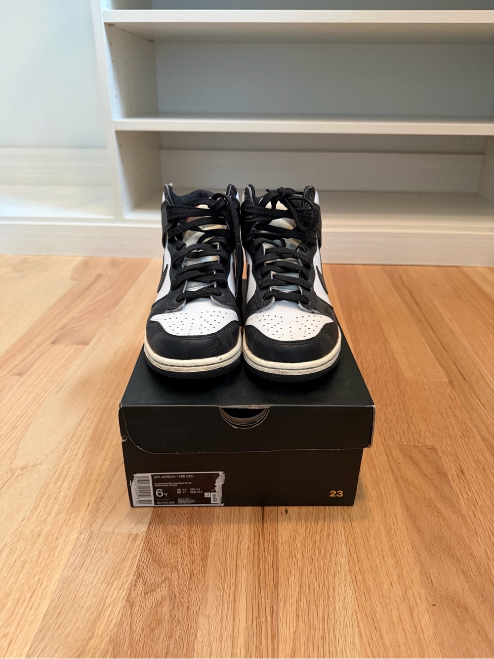 Jordan Kids Black and White High-Top Sneakers